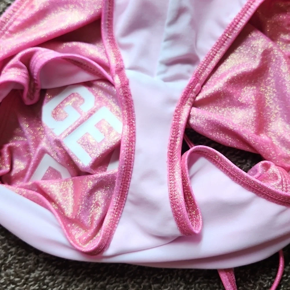DIPPIN DAISY’S pink glitter Getting Drunk one-piece swimsuit